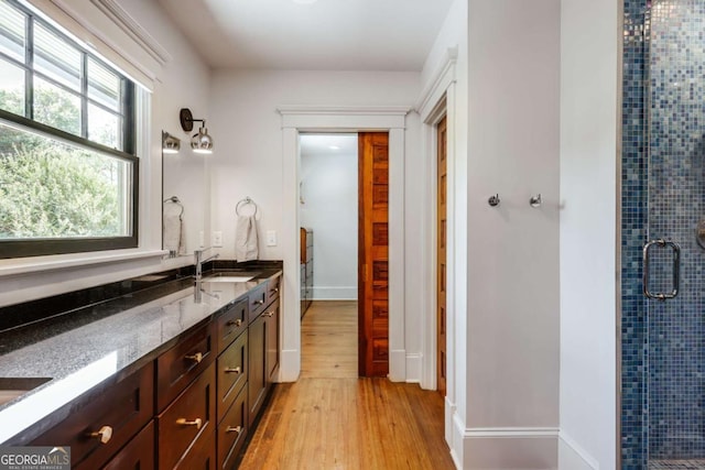 781 Boulevard, Athens, GA 30601 - bathroom featuring wood finished floors, double vanity, and a shower stall