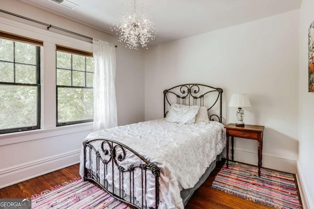 781 Boulevard, Athens, GA 30601 - bedroom with wood finished floors, a chandelier, and baseboards