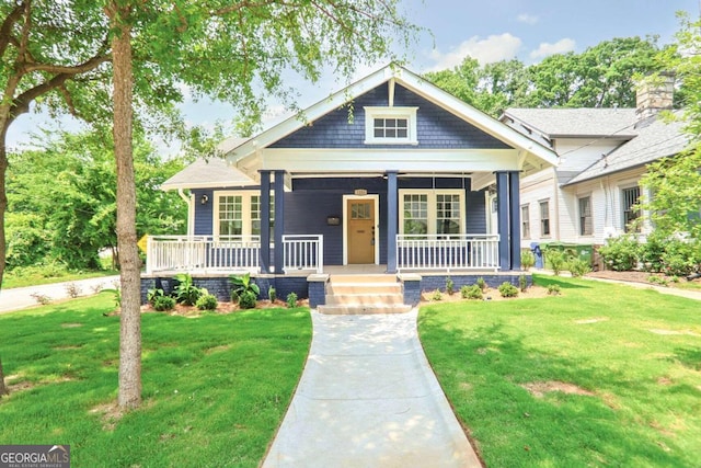 1253 Lucile Ave SW, Atlanta, GA 30310 - view of front facade with covered porch and a front yard