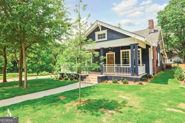 1253 Lucile Ave SW, Atlanta, GA 30310 - view of front of property featuring a porch, a chimney, and a front yard