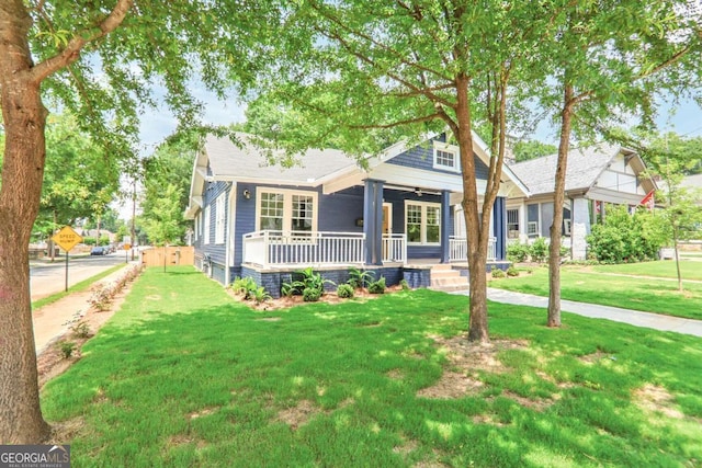 1253 Lucile Ave SW, Atlanta, GA 30310 - view of front facade with a porch, a front yard, and a ceiling fan