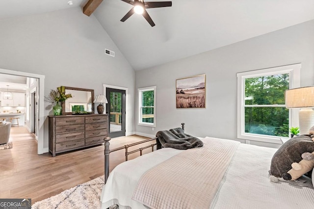 980 Bridge Rd, Ellijay, GA 30540 - bedroom with light wood-type flooring, high vaulted ceiling, beam ceiling, access to outside, and ceiling fan
