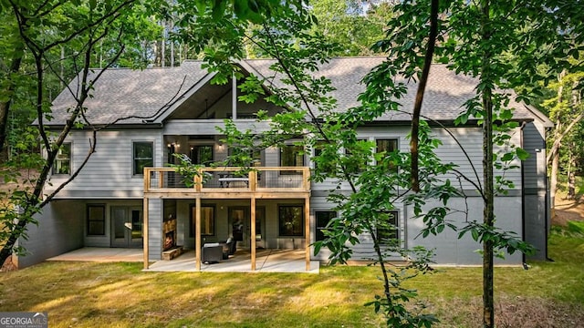 980 Bridge Rd, Ellijay, GA 30540 - rear view of house with a lawn, a patio area, a shingled roof, and a deck