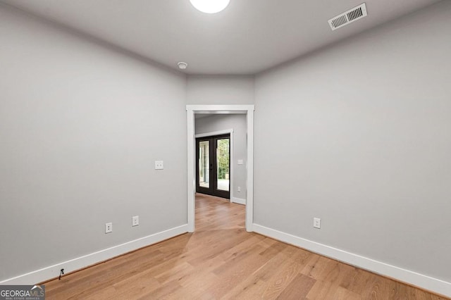 980 Bridge Rd, Ellijay, GA 30540 - unfurnished room with light wood-style flooring and french doors
