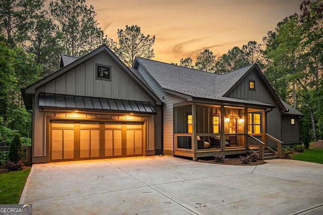 980 Bridge Rd, Ellijay, GA 30540 - modern farmhouse with covered porch, a shingled roof, and board and batten siding
