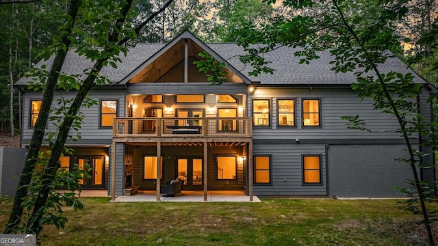 980 Bridge Rd, Ellijay, GA 30540 - rear view of house featuring a balcony, a yard, french doors, a patio area, and a shingled roof