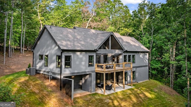 980 Bridge Rd, Ellijay, GA 30540 - back of property with a patio, a lawn, a wooden deck, and roof with shingles