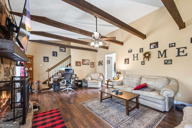 2019 Wiltshire Pl, Snellville, GA 30078 - living area featuring beamed ceiling, ceiling fan, stairway, wood finished floors, and a fireplace