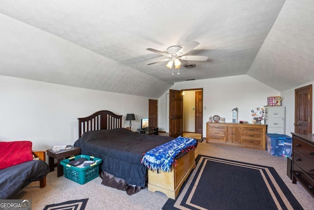 2019 Wiltshire Pl, Snellville, GA 30078 - carpeted bedroom featuring lofted ceiling, a textured ceiling, and a ceiling fan