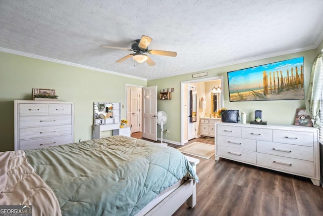 2019 Wiltshire Pl, Snellville, GA 30078 - bedroom with dark wood-type flooring, crown molding, a ceiling fan, connected bathroom, and a textured ceiling