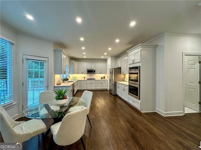 365 Morning Dew Cir, Roswell, GA 30075 - dining space with baseboards, recessed lighting, dark wood-style floors, and crown molding