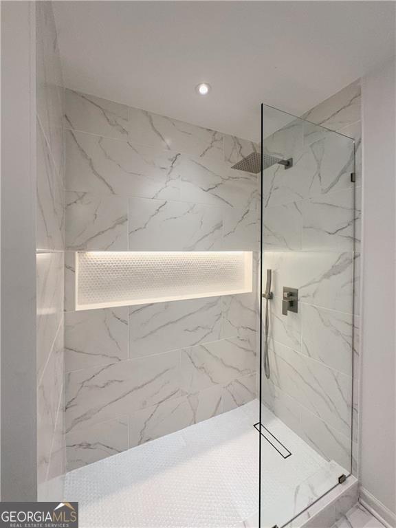 365 Morning Dew Cir, Roswell, GA 30075 - full bath featuring a marble finish shower, recessed lighting, and marble finish floors