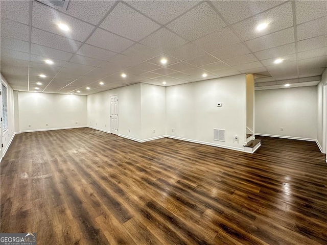 365 Morning Dew Cir, Roswell, GA 30075 - finished basement featuring dark wood-type flooring, baseboards, stairway, recessed lighting, and a drop ceiling