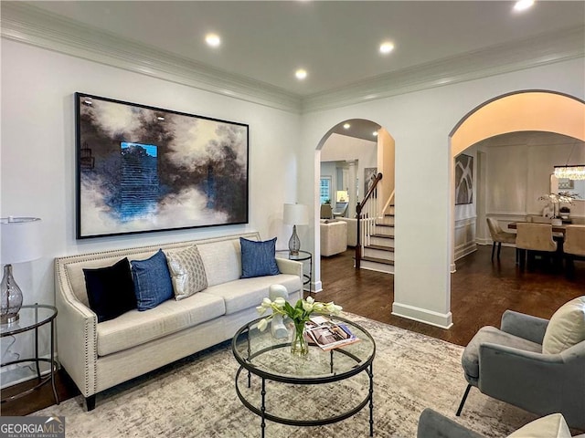 365 Morning Dew Cir, Roswell, GA 30075 - living area with arched walkways, wood finished floors, ornamental molding, stairs, and recessed lighting