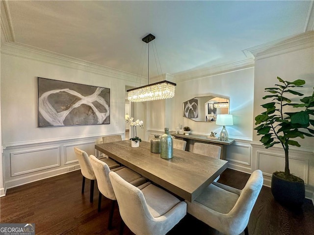 365 Morning Dew Cir, Roswell, GA 30075 - dining room featuring a chandelier, a decorative wall, dark wood-style flooring, crown molding, and a wainscoted wall