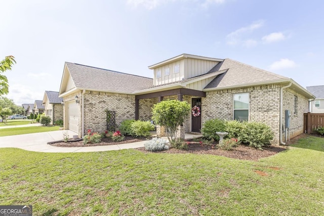 213 Barnyard Way, Perry, GA 31069 - view of front of house with brick siding, a garage, driveway, and board and batten siding