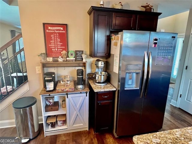 37 Frost, Dawsonville, GA 30534 - kitchen with stainless steel fridge, dark wood finished floors, light stone countertops, and dark brown cabinetry