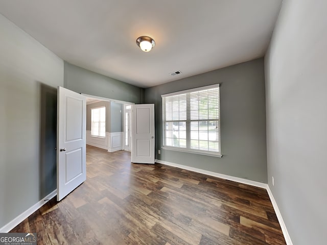 3507 Hideaway Ln, Loganville, GA 30052 - unfurnished room featuring wood finished floors and baseboards