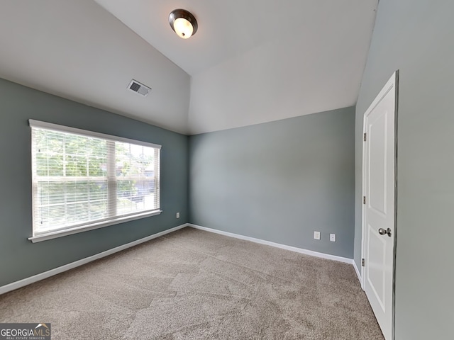 3507 Hideaway Ln, Loganville, GA 30052 - empty room featuring carpet, lofted ceiling, and baseboards