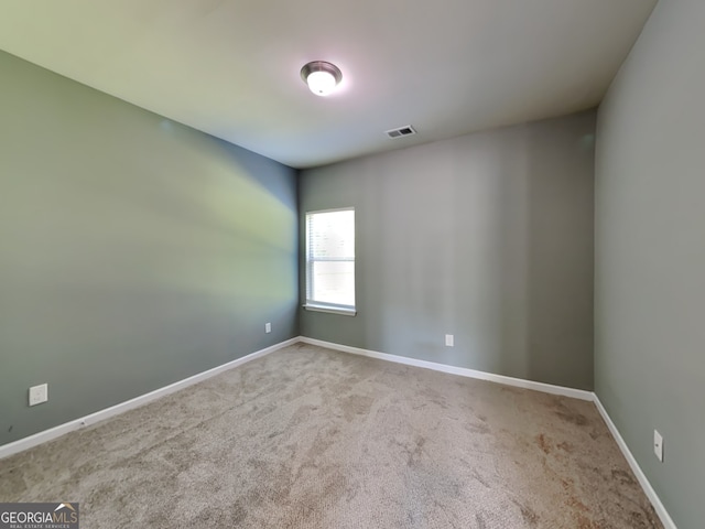 3507 Hideaway Ln, Loganville, GA 30052 - spare room with carpet flooring and baseboards