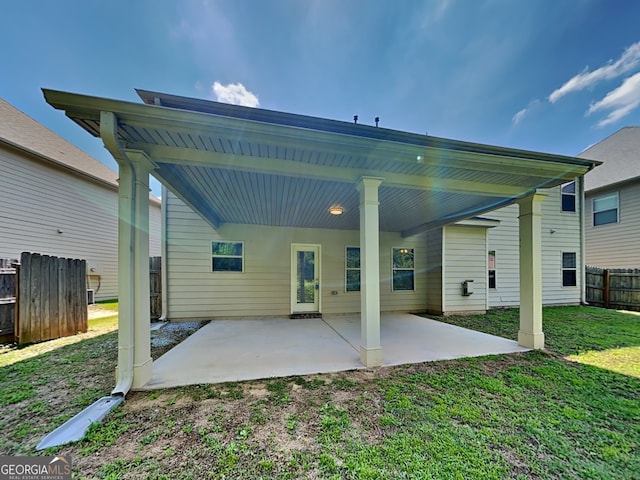 3507 Hideaway Ln, Loganville, GA 30052 - rear view of house with a patio area