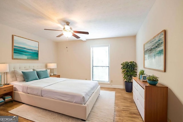 408 River Run Dr, Sandy Springs, GA 30350 - bedroom with light wood-style floors, baseboards, and a ceiling fan