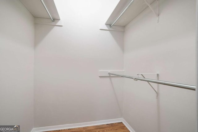 408 River Run Dr, Sandy Springs, GA 30350 - walk in closet featuring light wood finished floors