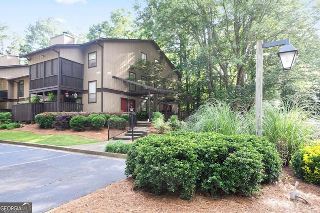 408 River Run Dr, Sandy Springs, GA 30350 - view of front of home with a chimney