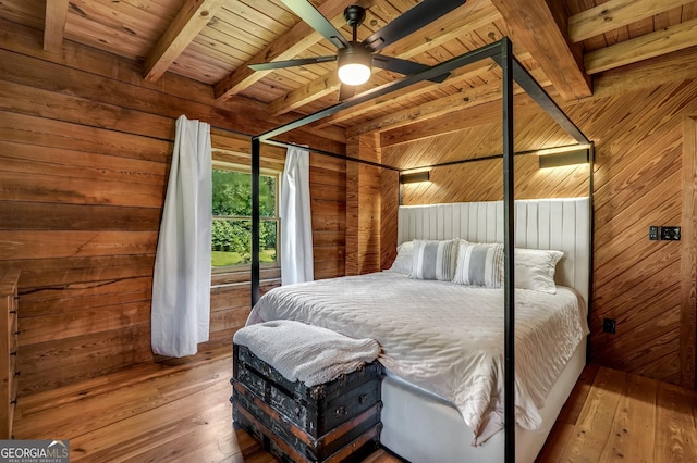 121 Samples Rd, Forsyth, GA 31029 - bedroom featuring hardwood / wood-style flooring, wooden walls, wooden ceiling with exposed beams, access to outside, and ceiling fan
