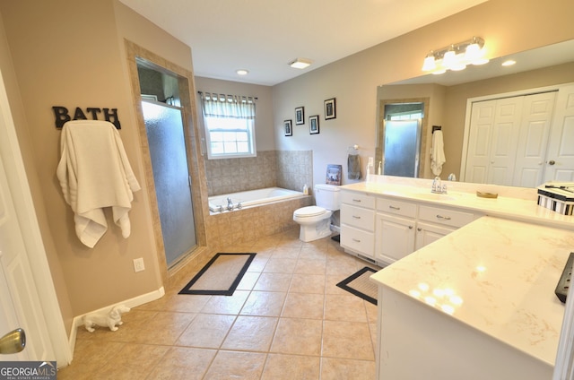 2025 Chicken Rd, Dudley, GA 31022 - bathroom with vanity, a bath, tile patterned flooring, a stall shower, and recessed lighting