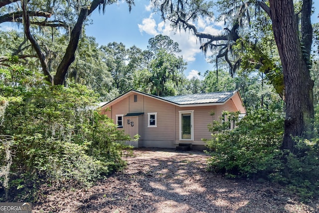 1069 Shellman Hammock Dr NE, Townsend, GA 31331 - back of property featuring a metal roof