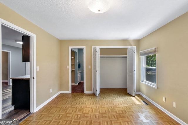 1069 Shellman Hammock Dr NE, Townsend, GA 31331 - unfurnished bedroom with a closet and baseboards