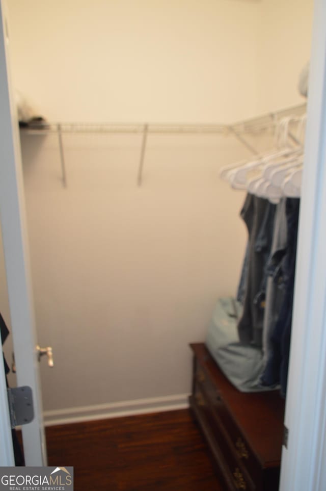 5427 Woodstream Ct, Gainesville, GA 30507 - spacious closet with dark wood-style floors