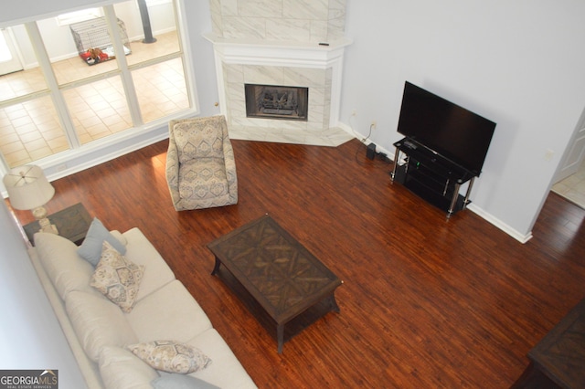 5427 Woodstream Ct, Gainesville, GA 30507 - living area with wood finished floors, a fireplace, and baseboards