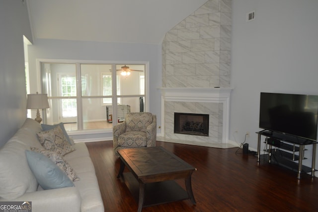 5427 Woodstream Ct, Gainesville, GA 30507 - living area featuring wood finished floors, lofted ceiling, a fireplace, and ceiling fan