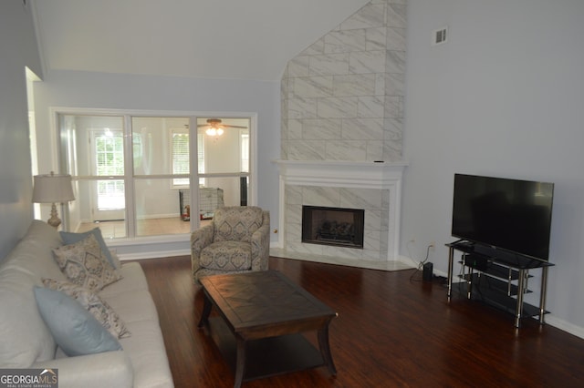 5427 Woodstream Ct, Gainesville, GA 30507 - living room featuring lofted ceiling, wood finished floors, baseboards, a premium fireplace, and a ceiling fan