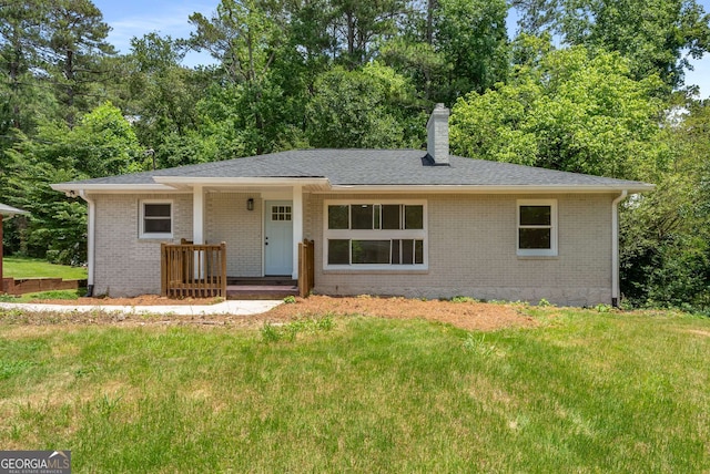 1364 Willis Mill Rd SW, Atlanta, GA 30311 - ranch-style home featuring a chimney, a front yard, and brick siding