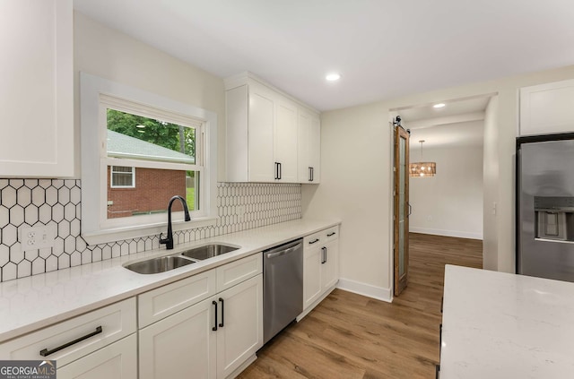 1364 Willis Mill Rd SW, Atlanta, GA 30311 - kitchen with stainless steel appliances, a sink, white cabinets, and recessed lighting