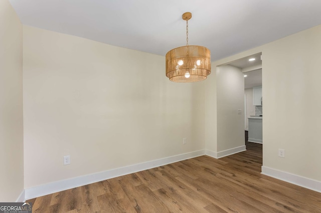 1364 Willis Mill Rd SW, Atlanta, GA 30311 - unfurnished room with baseboards, wood finished floors, recessed lighting, and a chandelier