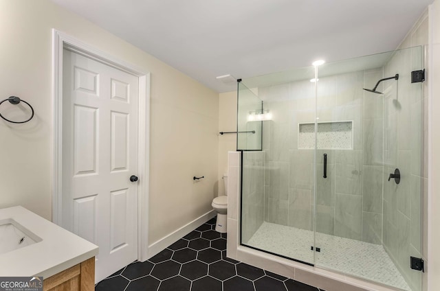 1364 Willis Mill Rd SW, Atlanta, GA 30311 - bathroom with a shower stall, vanity, tile patterned flooring, toilet, and baseboards