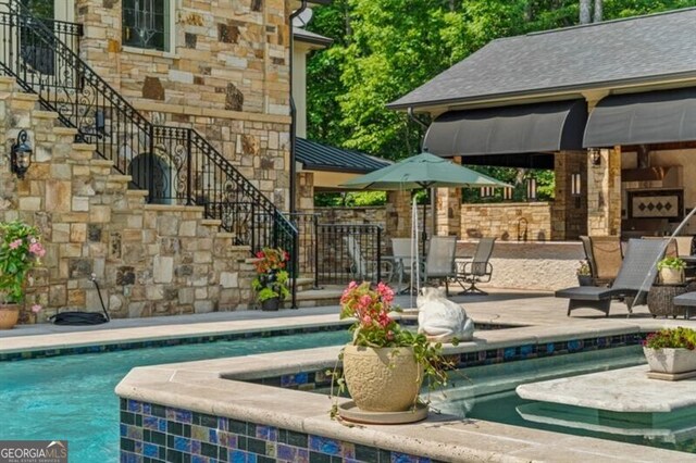 37 Retreat Rdg, Cartersville, GA 30120 - swimming pool with stairway and a patio