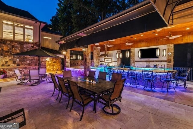 37 Retreat Rdg, Cartersville, GA 30120 - view of patio with a ceiling fan, outdoor dining space, and a bar