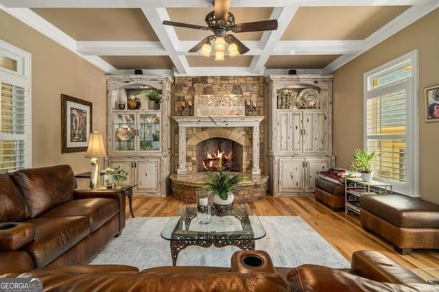 37 Retreat Rdg, Cartersville, GA 30120 - living area with a fireplace, a ceiling fan, wood finished floors, beam ceiling, and coffered ceiling