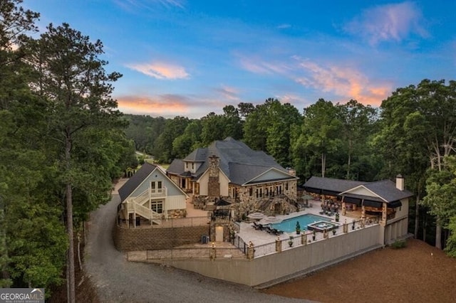 37 Retreat Rdg, Cartersville, GA 30120 - outdoor pool with a fenced backyard, a patio area, and a wooded view