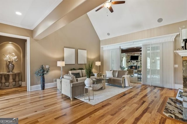 37 Retreat Rdg, Cartersville, GA 30120 - living room with a fireplace, a ceiling fan, light wood-style flooring, and high vaulted ceiling