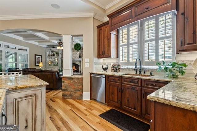 37 Retreat Rdg, Cartersville, GA 30120 - kitchen with stainless steel dishwasher, arched walkways, coffered ceiling, light wood-style flooring, and light stone counters