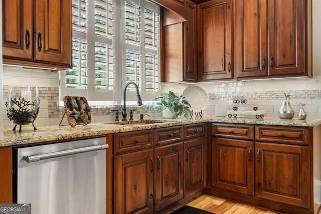 37 Retreat Rdg, Cartersville, GA 30120 - kitchen featuring stainless steel dishwasher, light stone counters, backsplash, and light wood-style floors