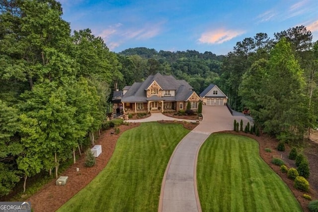 37 Retreat Rdg, Cartersville, GA 30120 - view of front of home featuring a front lawn, driveway, and a view of trees