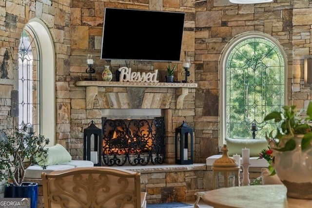 37 Retreat Rdg, Cartersville, GA 30120 - living area featuring a stone fireplace and arched walkways