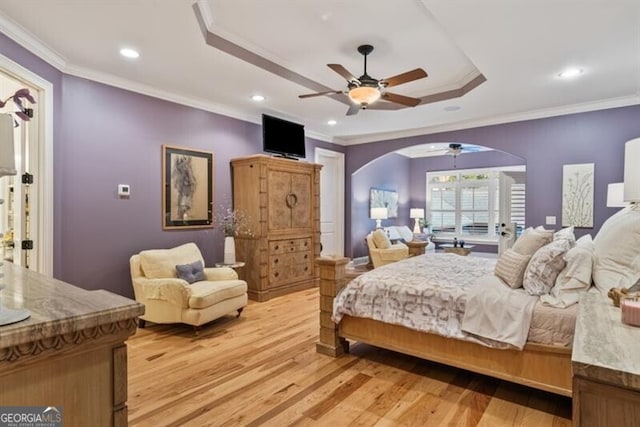 37 Retreat Rdg, Cartersville, GA 30120 - bedroom featuring arched walkways, light wood-type flooring, a tray ceiling, ornamental molding, and recessed lighting